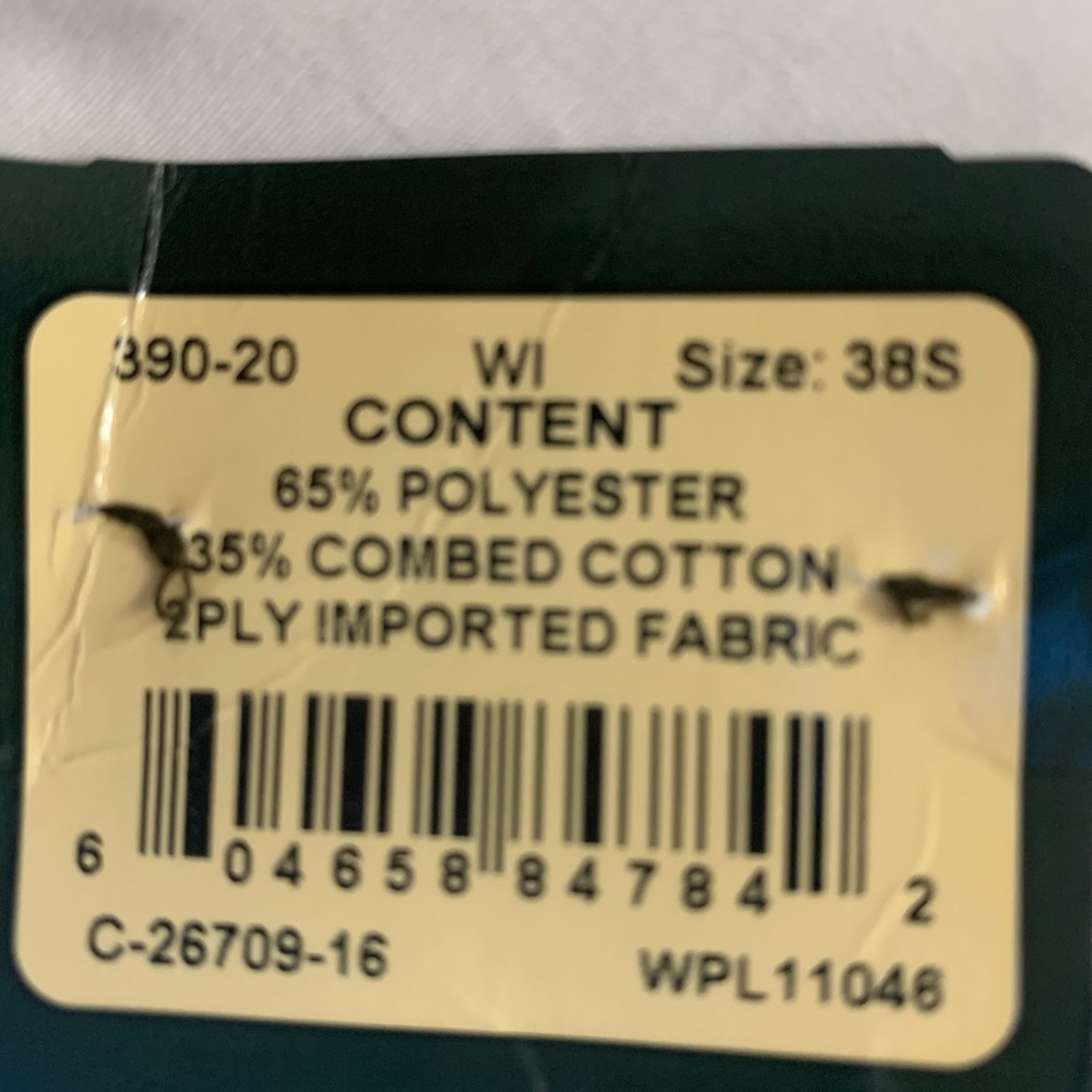 New $100 pants. Never worn COTTON/POLY
PLEATED REG RISE